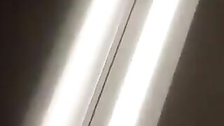 A woman's ass in a fishnet stocking and thong.