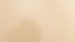 Girl pees into the bathtub.