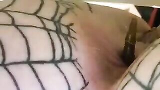 Chubby slut takes a shit in her fishnet stockings
