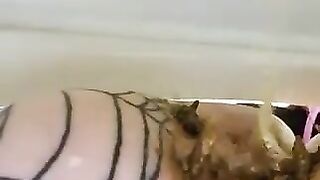 Slut in stockings shits on her face