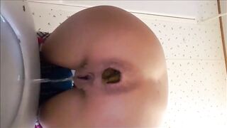 Petite teen shitting a huge turd