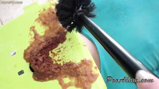 Dirty Asian girl pooping on slave