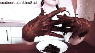 Playing with her chocolate shit