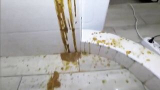 Spraying the wall with her messy shit