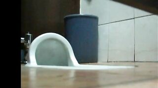 Two women caught pooping through spy cam