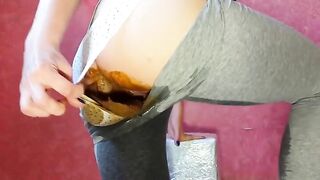 Masked babe pissing and pooping in her panty