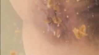 Woman shitting chunks in the water of bathtub