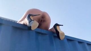 Naked girl poops on the container