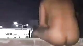 Naked babe on the balcony