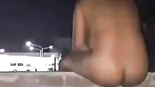 Naked babe on the balcony