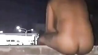 Naked babe on the balcony