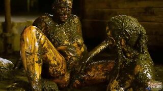 Two lovely girls in cowdung play