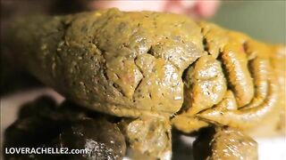 Cute brunette girl in eye mask masturbates and poo