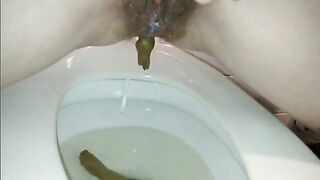 Blonde babe pissing and pooping in hot closeup