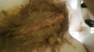 Australian babe rubbing her hairy pussy with shit