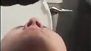 Covering her face with shit