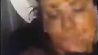 Covering her face with shit