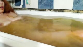 Nasty girl bathing in shit