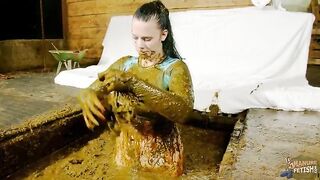 Betty playing in cowshit