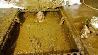 Betty playing in cowshit