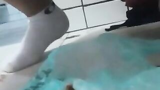 A blonde babe sits on the toilet and takes a massive shit
