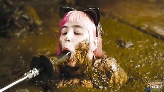 Catwoman Lyndra masturbates and baths in cowshit