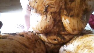 Massive tits lady covered in shit