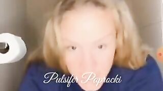 Cute looking blonde girl dropping heavy load