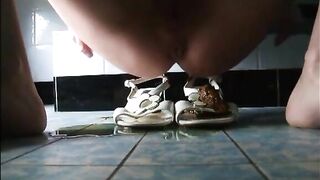 Girl shitting on sandals before wearing them