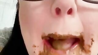 Nerdy lady eating shit