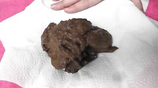 Dark messy poop