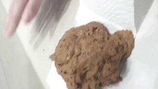 Babe in long black boots pooping in the toilet