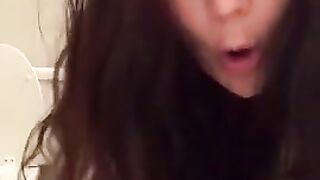 Kinky brunette girl pooping closeup