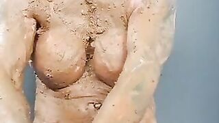 MILF with piercing nipples smearing shit