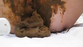 Lady bangs her pussy and ass hole with dildo