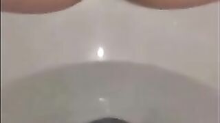 Creampied woman shitting in the toilet