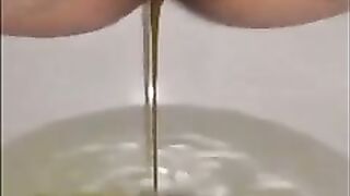 Creampied woman shitting in the toilet