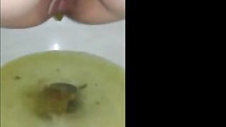 Creampied woman shitting in the toilet