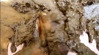 Lady is playing with shit on her feet