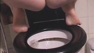 Girl on period shit and piss closeup