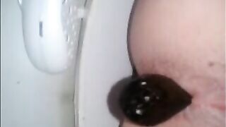 Girl shitting a dark turd