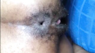 Hairy asshole ebony shitting closeup
