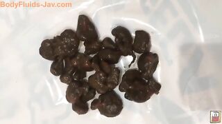 Stunning Jap with hairy pussy pooping nicely