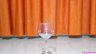 Gorgeous hot babe poops in the glass