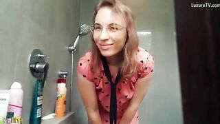 kinky girl plays in the shower