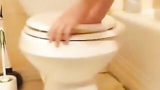 Skinny blonde takes huge shit on toilet