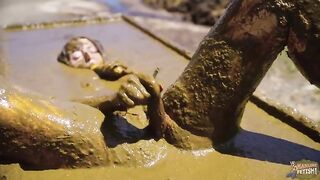 Busty babe playing in cowshit