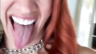 Redhead strip tease and shit nicely on the dildo