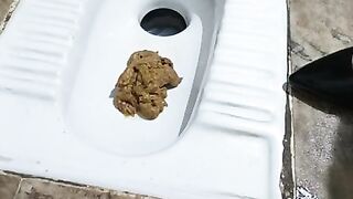 Slutty lady shitting in the toilet