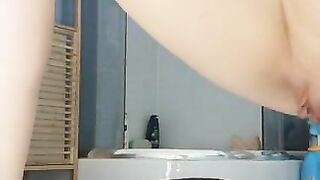 Smooth pink pussy girl pooping closeup